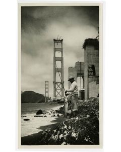 Man fishing, partial bridge in background, 1935 